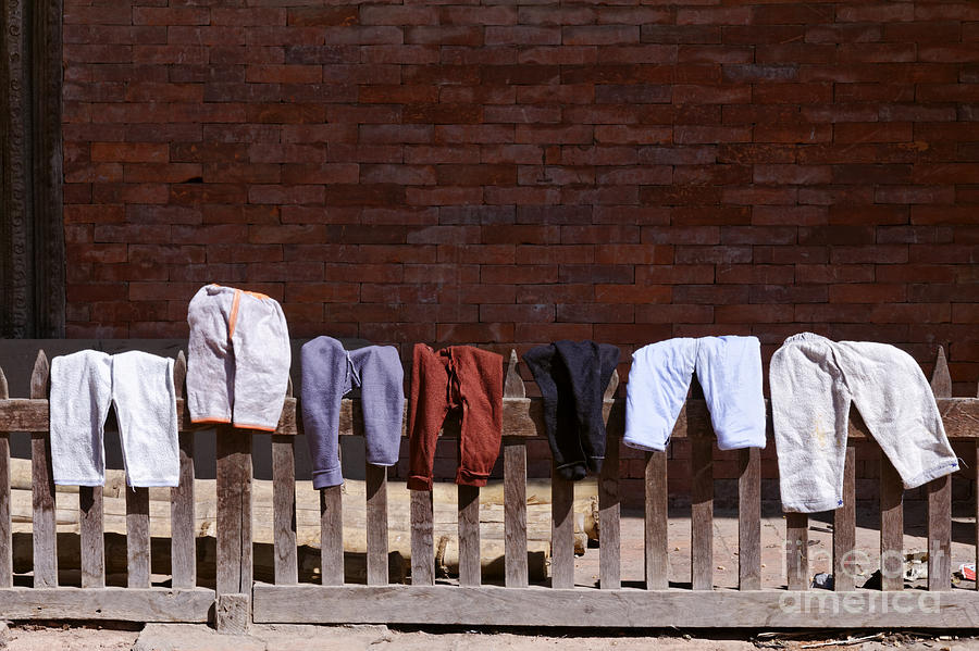 Clothing Photograph - Clothes drying in Durbar Square in Patan Nepal by Robert Preston