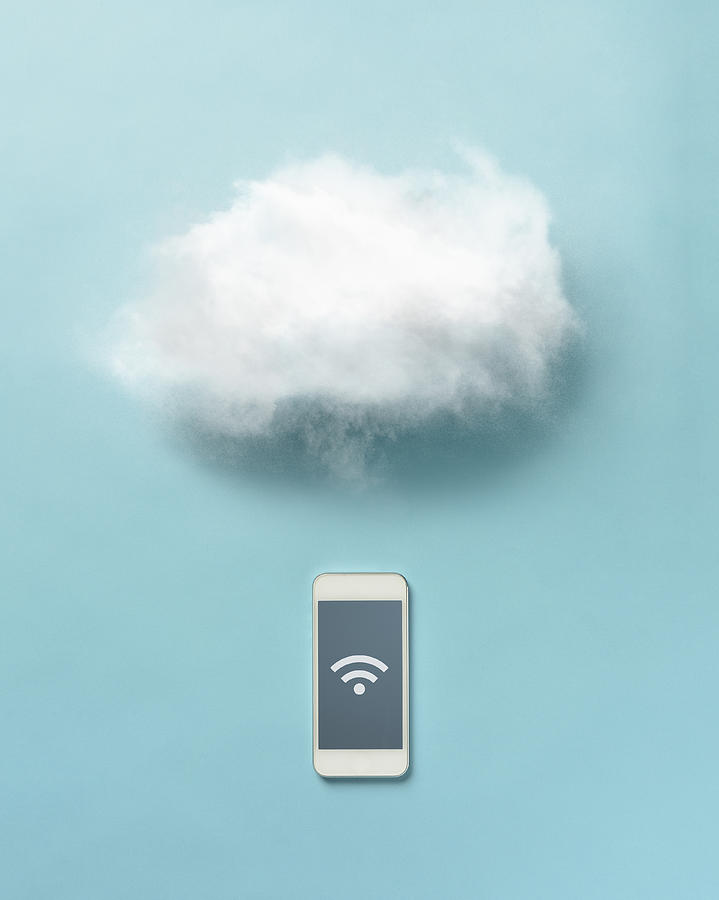 Cloud and smartphone Photograph by Yagi Studio