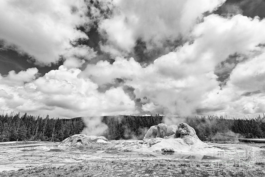 Yellowstone National Park Photograph - Cloud Creators - Twin geysers steaming under a dramatic sky in Yellowstone National Park. by Jamie Pham