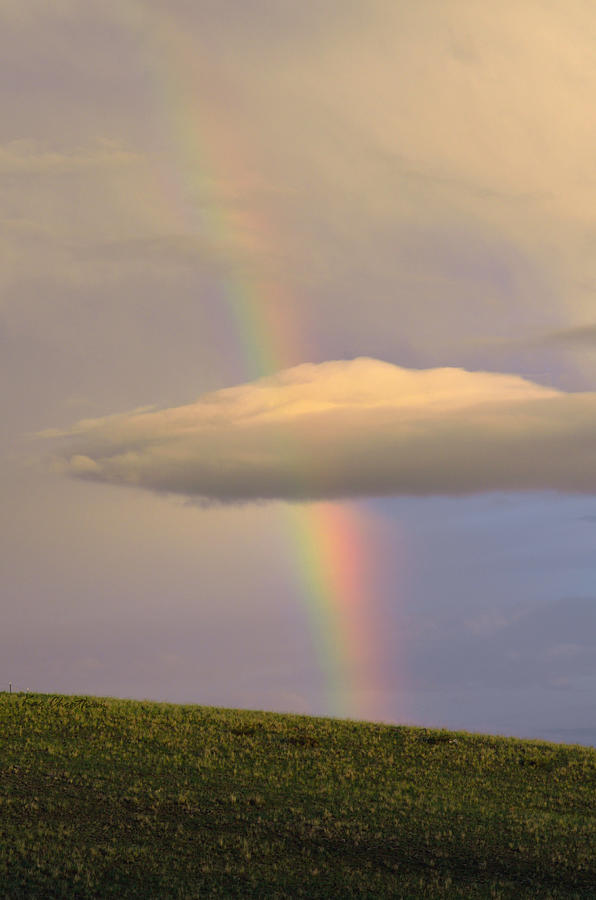 Cloud Passing Through Rainbow Photograph by Kae Cheatham