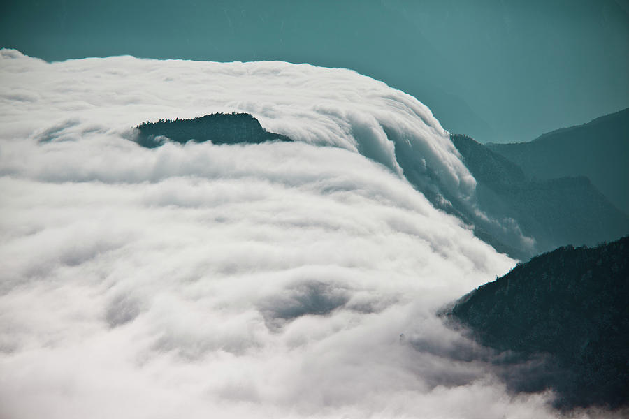 Cloud Waterfall In Cattle Back Mountain Photograph by Bihaibo