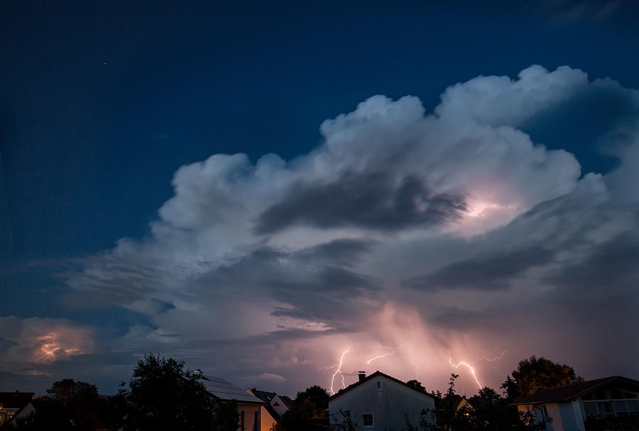Cloud with thunder lightning Photograph by Umkehrer