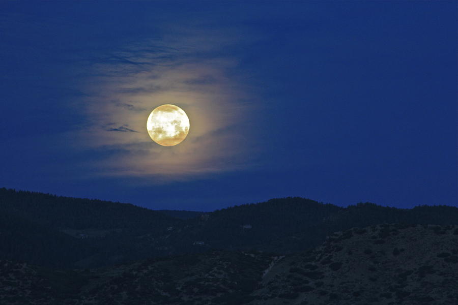 Clouds Around the Moon Photograph by Bill Wiebesiek