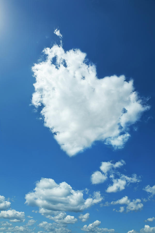 Clouds Forming Heart In Sky Photograph by Yuji Sakai