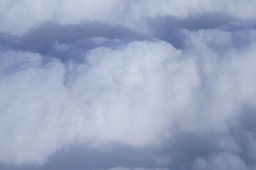 Clouds Photograph by Kristine Bogdanovich