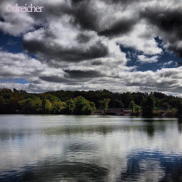 Bridge Photograph - #clouds #lake #sky #reflections by Denise Reicher