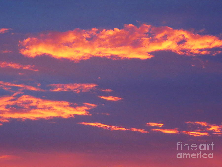 Clouds on Fire. Photograph by Robert Birkenes