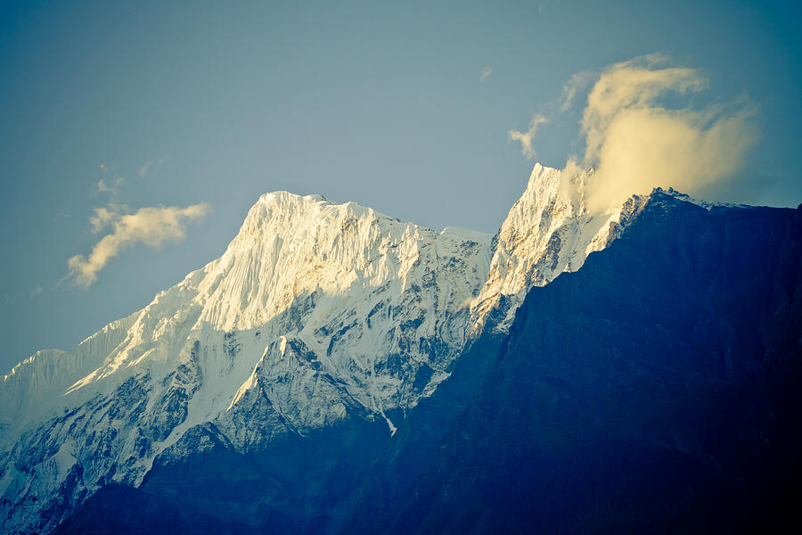 Clouds on the peak Himalayan Photograph by Raimond Klavins