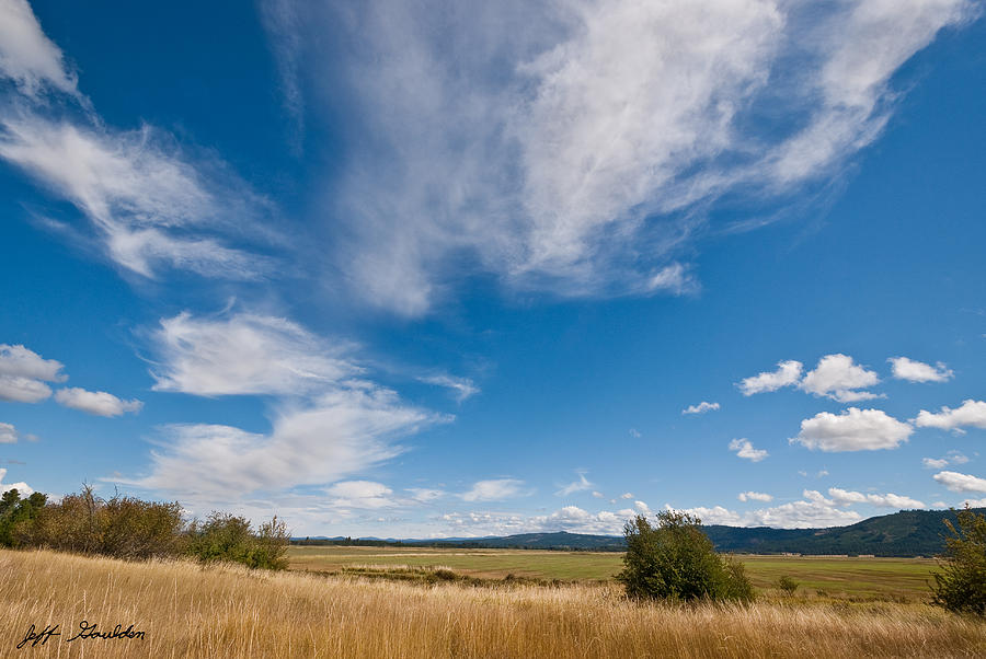 Clouds Over a Wildlife Refuge Photograph by Jeff Goulden