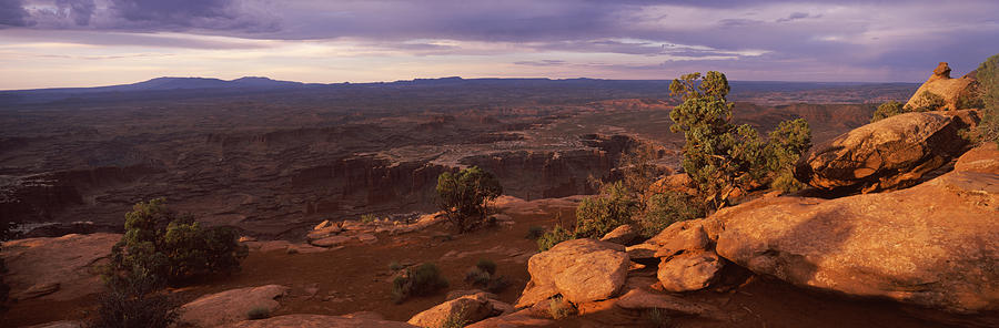 Canyonlands National Park Photograph - Clouds Over An Arid Landscape by Panoramic Images