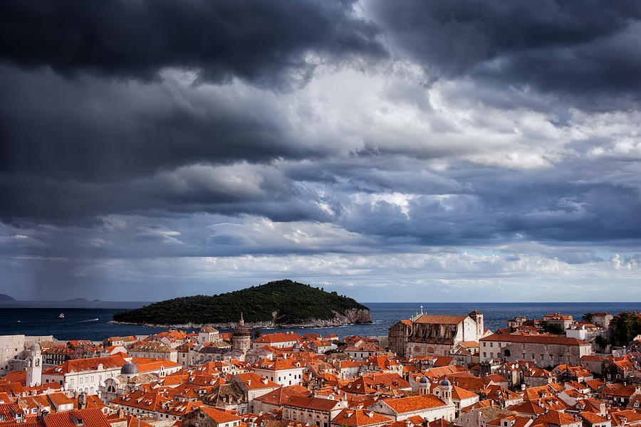 Clouds over Dubrovnik and Lokrum Island Photograph by Artur Bogacki