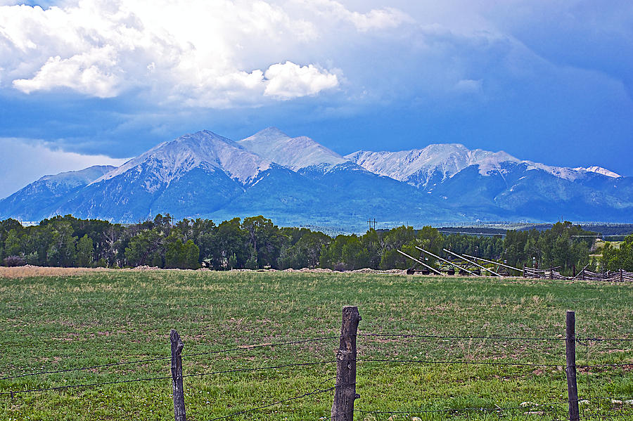 Clouds over Snow-covered Mountain Peaks in Colorado Photograph by Ruth Hager
