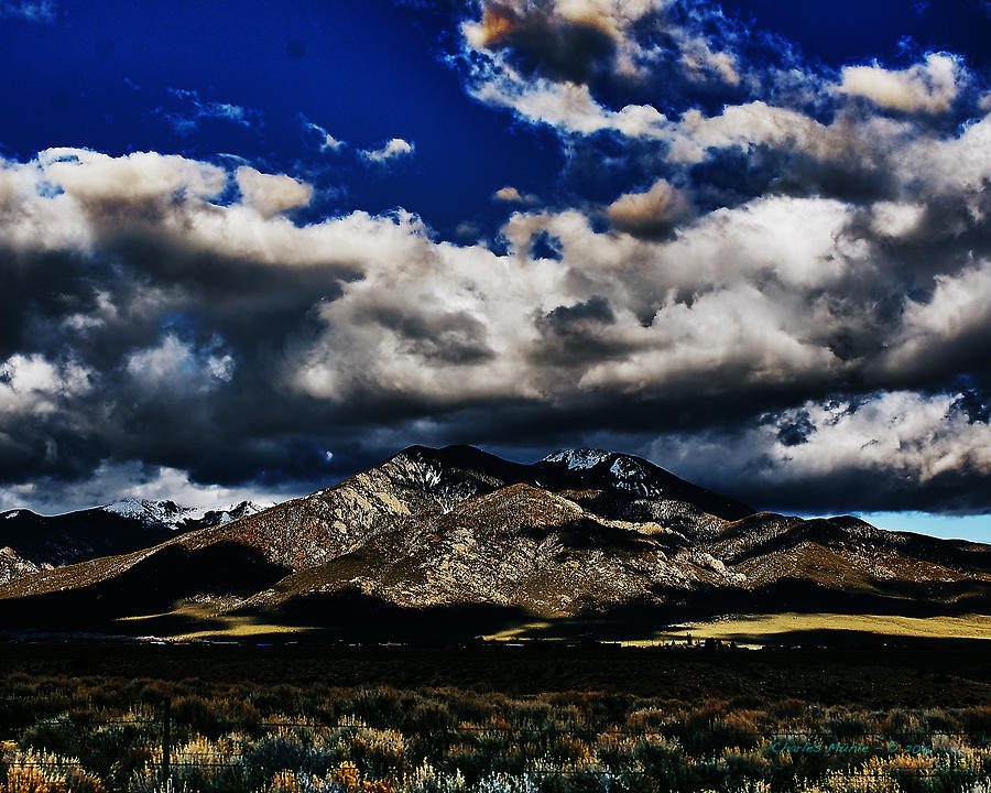 Clouds over Taos Photograph by Charles Muhle