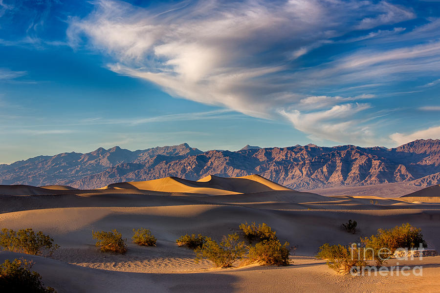 Clouds Over The Mesquite Dunes Photograph by Mimi Ditchie