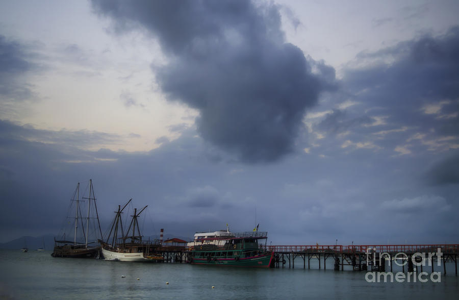 Clouds Over The Pier Photograph by Michelle Meenawong