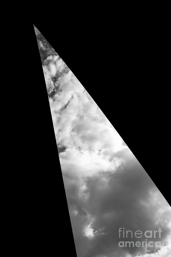 Clouds through triangle in black and white Photograph by Imagery by Charly