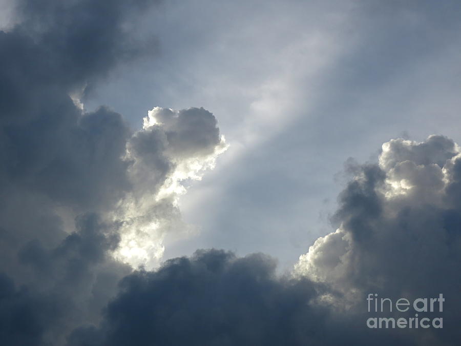 Cloudy Blue Sky. Photograph by Robert Birkenes
