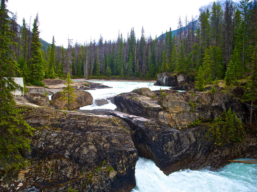 Cloudy Day at Natural Bridge over Kicking Horse River in Yoho National Park, British Columbia,Canada Photograph by Ruth Hager