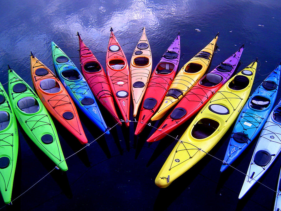 Clustered Kayaks Photograph by Owen Weber