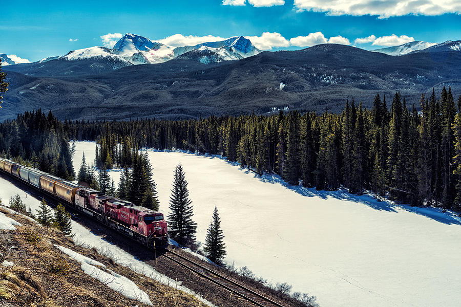 CN train through the Rockies Photograph by Levin Rodriguez