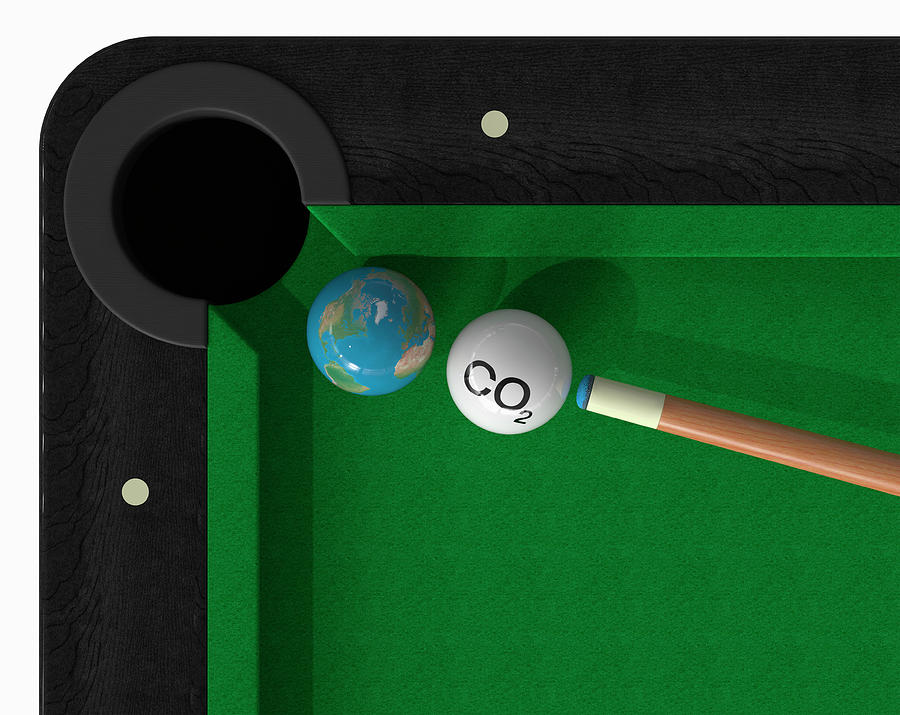 Co2 Cue Ball About To Hit Globe Ball Photograph by Ikon Images