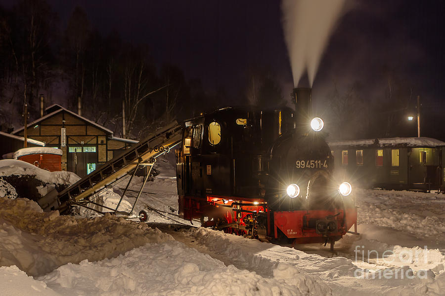 Winter Photograph - Coaling a steam locomotive at the engine shed by Christian Spiller
