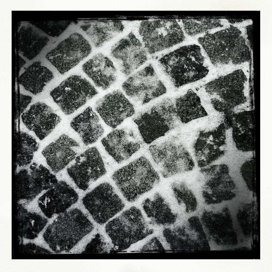 Black And White Photograph - Cobblestone pavement black and white by Matthias Hauser