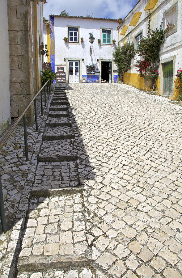 Cobblestone Street the Medieval Village of Obidos Photograph by David Letts