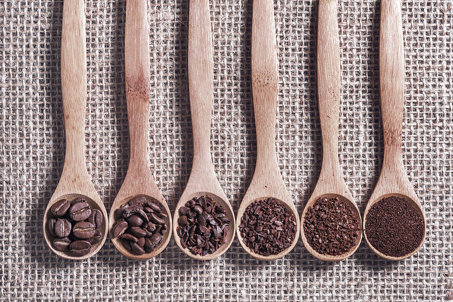 Coffee Beans And Grinds On Wooden Spoons Photograph by Ktsdesign/science Photo Library