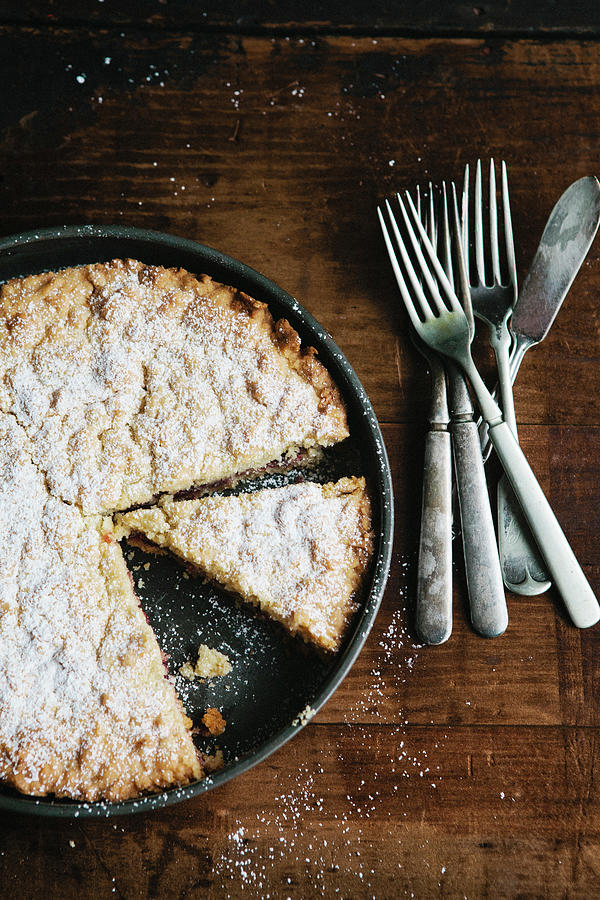 Coffee Cake In Rustic Pan With Forks Photograph by Alina Spradley