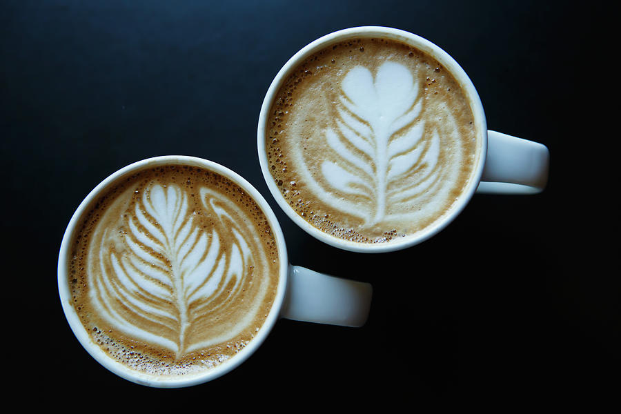 Coffee Delight With Latte Art Photograph by Laszlo Podor