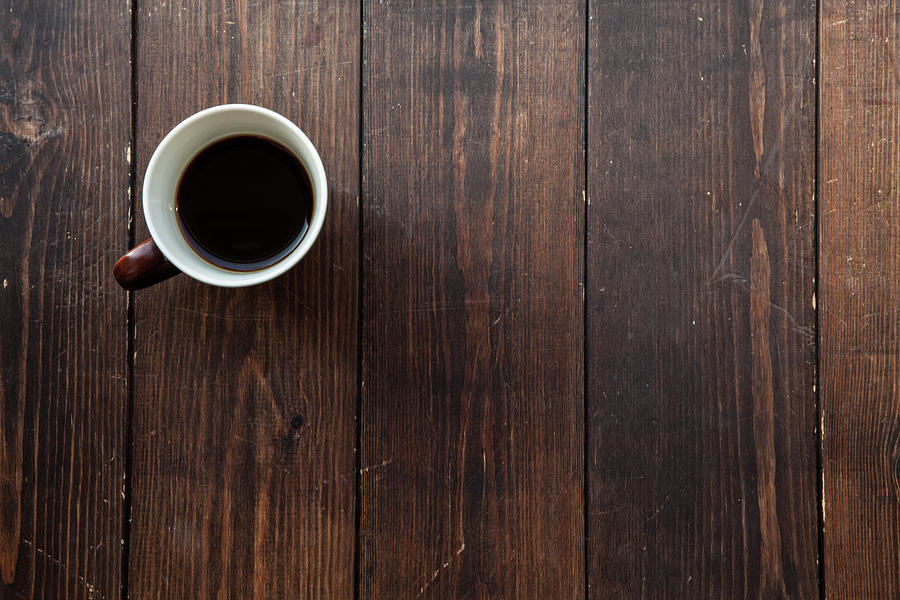 Coffee In A Mug On A Wooden Floor Photograph by Trevor Williams