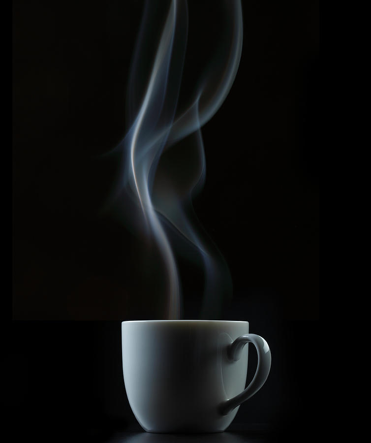 Coffee Or Tea Cup With Steam Photograph by Paul Taylor