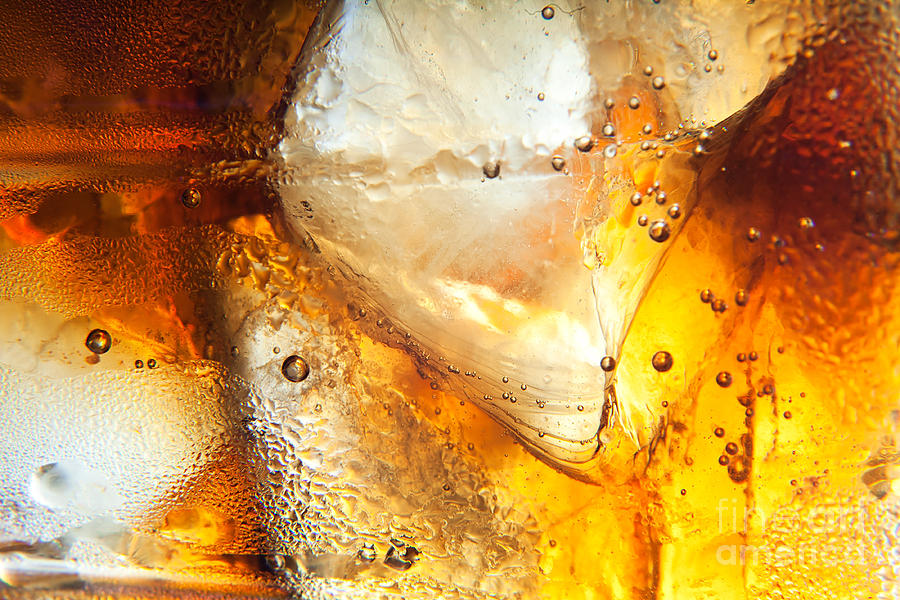 Cool Photograph - Cola background with ice by Michal Bednarek