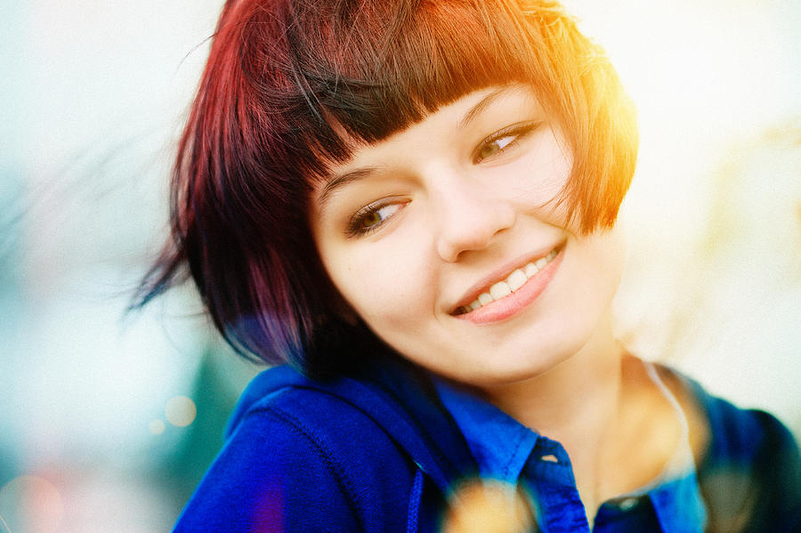 Color portrait of a charming and laughing girl Photograph by _ib_