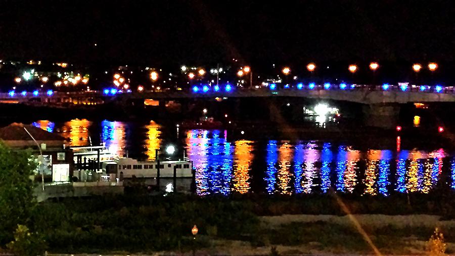 Colored Lights Reflect on Potomac Photograph by Kenny Glover