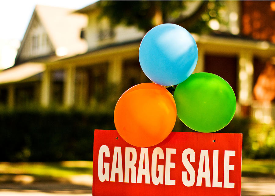 Colorful balloons with garage sale sign   Photograph by Www.reinhartstudios.com