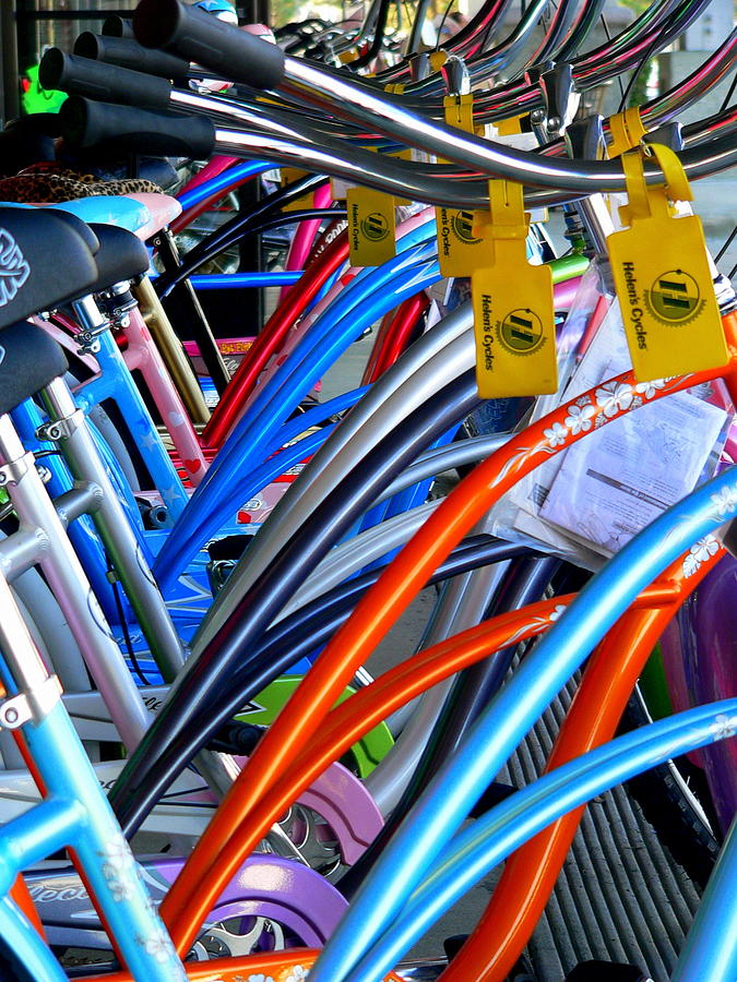Colorful Beach Cruiser Bikes Photograph by Jeff Lowe