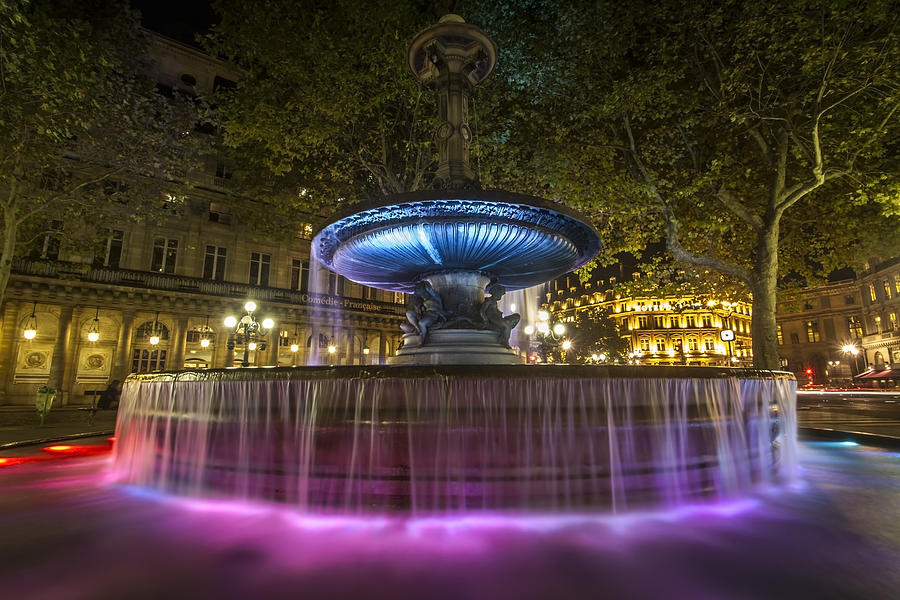 Colorful fountain at night in Paris Photograph by Sven Brogren