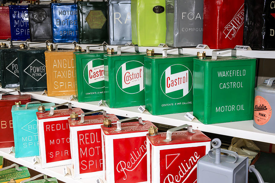 Colorful gas cans Photograph by Chris Smith