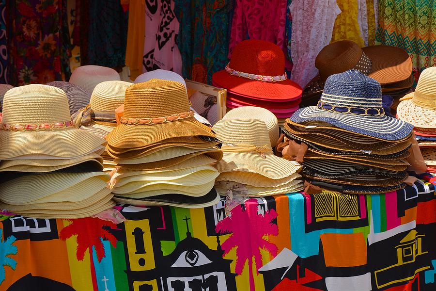 Colorful hats and fabrics for sale in town of Paraty, Rio de Janeiro Photograph by Markus Daniel