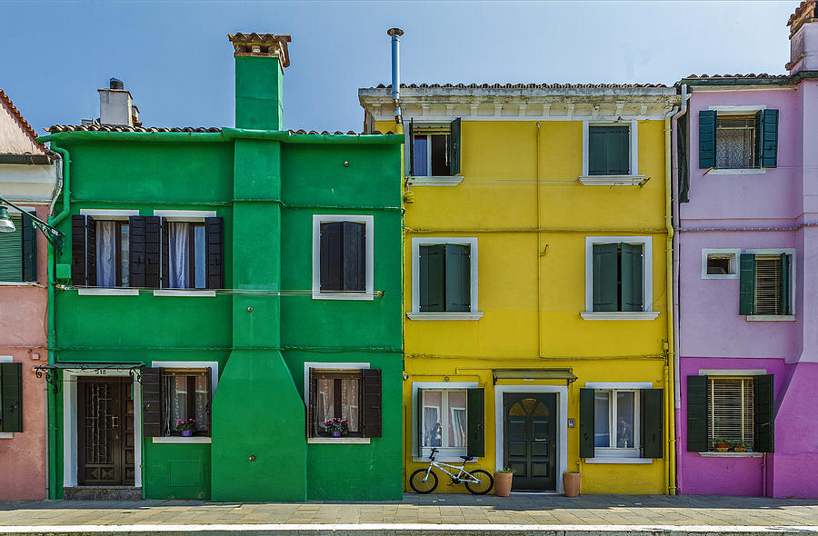 Colorful houses with bicycle Photograph by Roberto Pagani