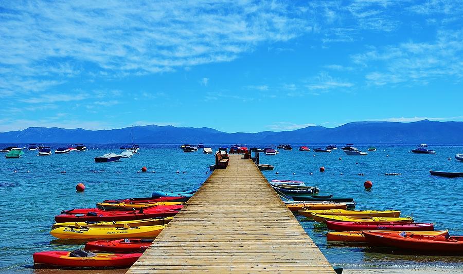 Colorful Kayaks at the Pier Photograph by Marilyn MacCrakin