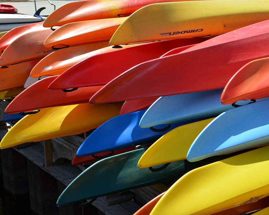 Boat Photograph - Colorful Kayaks by Toby McGuire
