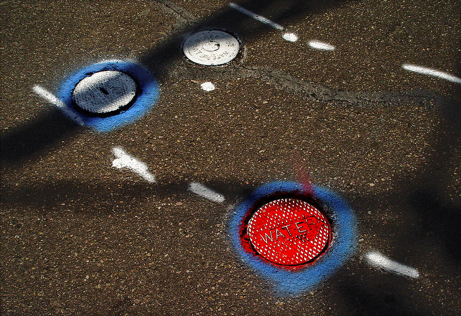 Transportation Photograph - Colorful Storm Drain Covers And White by Panoramic Images