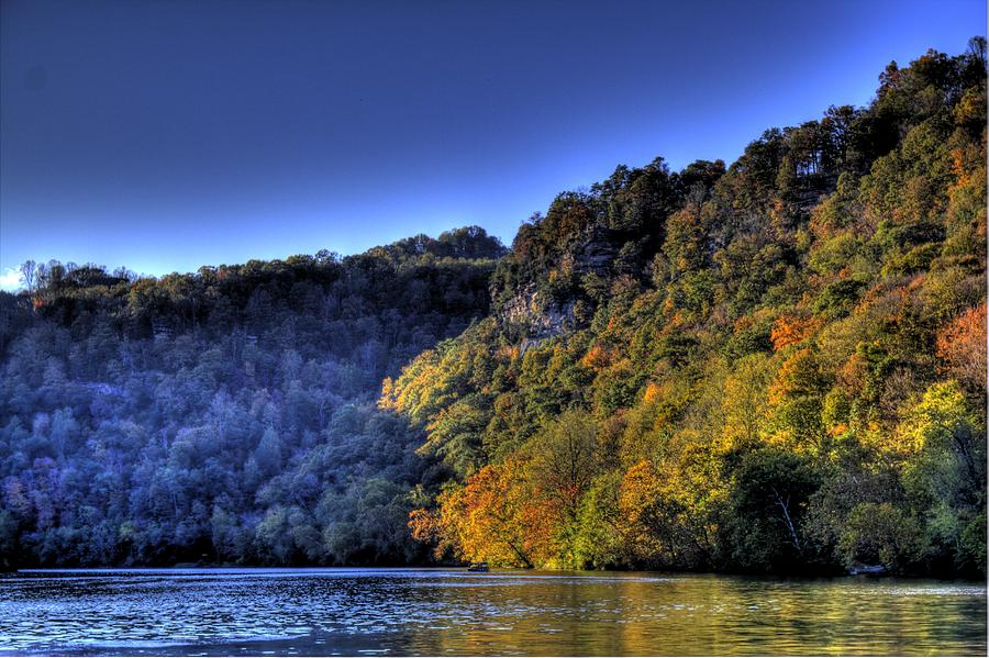 Colorful Trees over a lake Photograph by Jonny D
