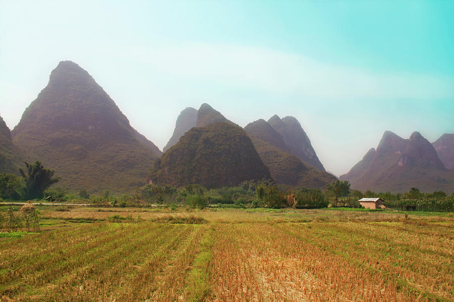 Colossal Mountains In A Farmland Photograph by Nathalie Daoust