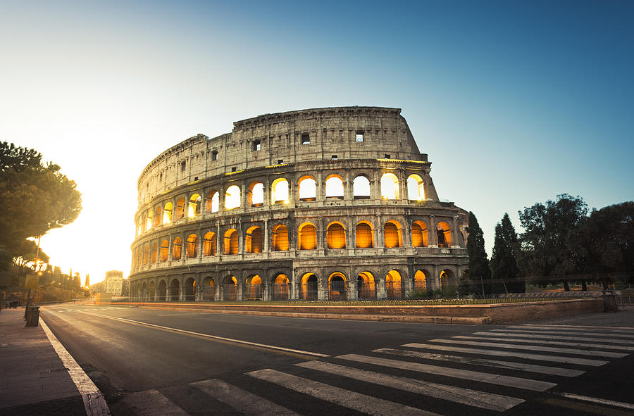 Colosseum in Rome, Italy at sunrise Photograph by Spooh