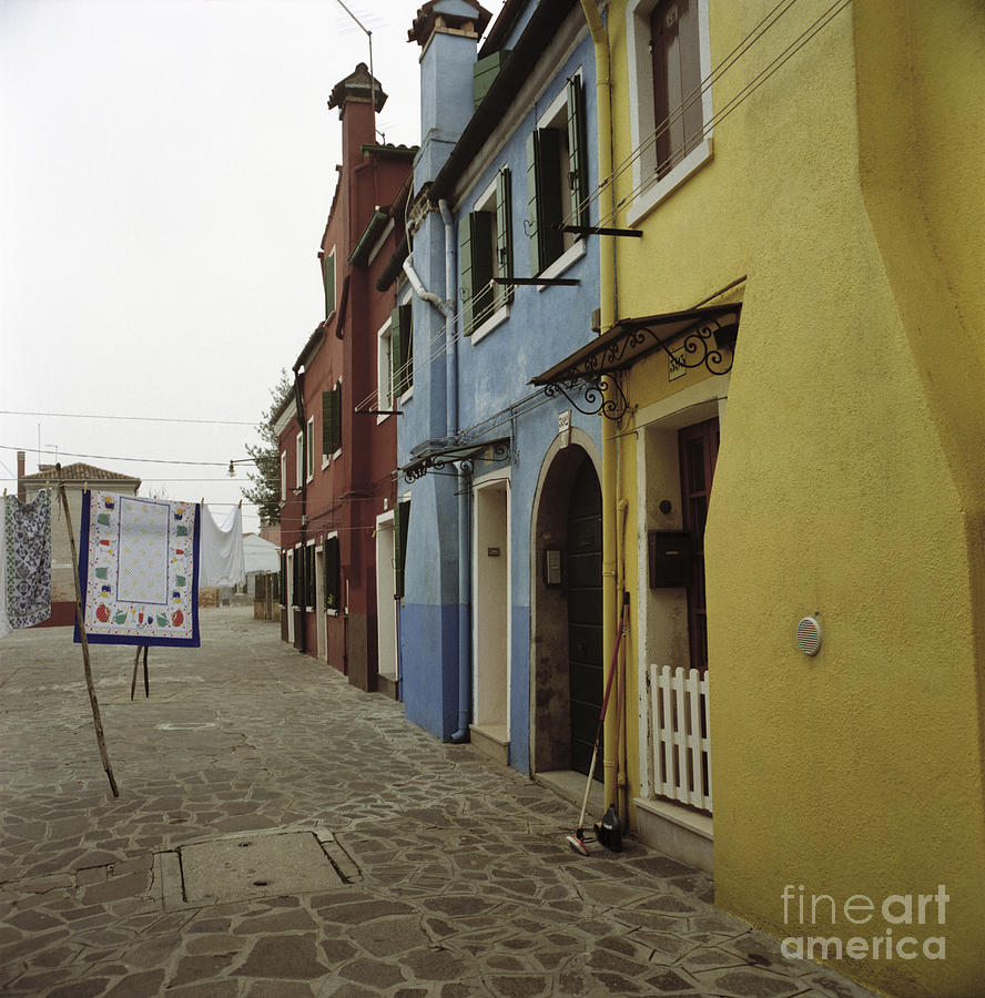 Coloured houses in Burano Photograph by Riccardo Mottola