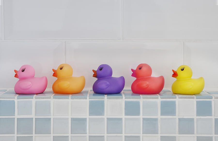 Coloured Rubber Ducks Photograph by Jonathan Kitchen